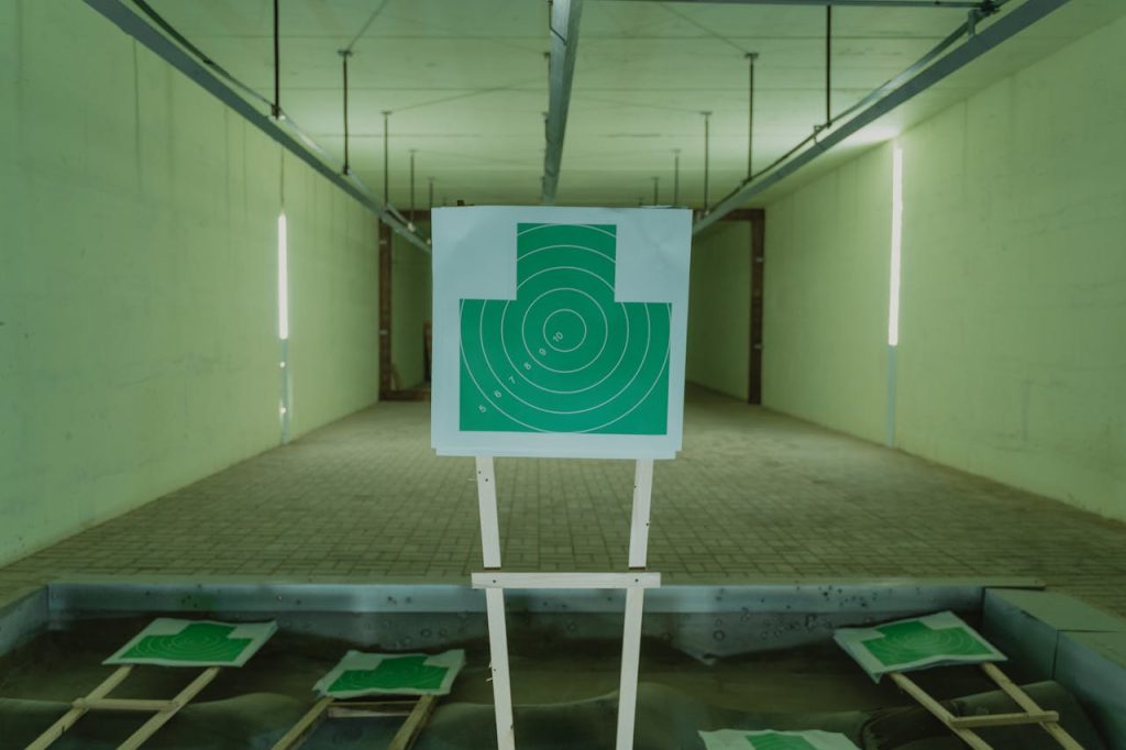 A green target at an indoor shooting range, ideal for aiming practice.