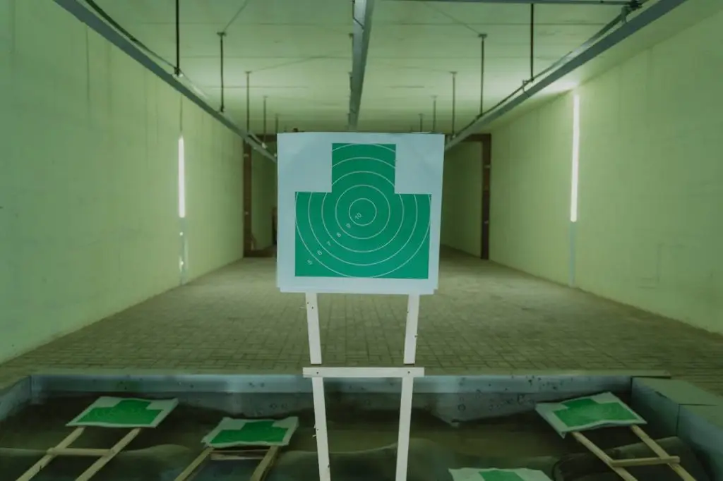 A green target at an indoor shooting range, ideal for aiming practice.