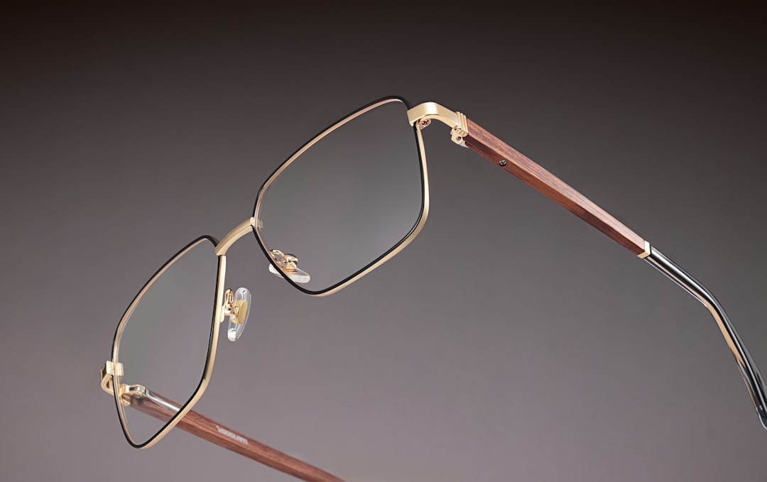Vooglam square eyeglasses with a gold frame and brown temple arms displayed on a neutral background.